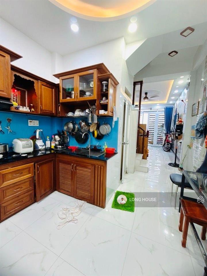 Nhà đẹp 4 tầng  hẻm oto gần mặt tiền ngay góc lê quang định  nguyễn văn đậu