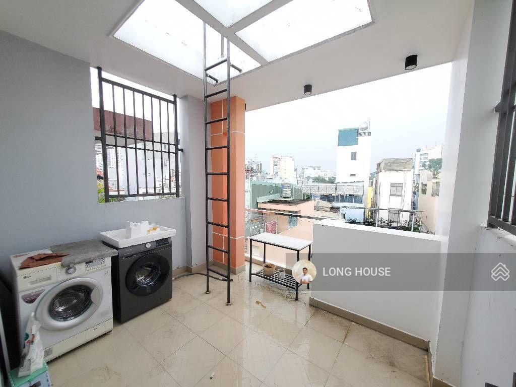 Nhà 5 tầng, 50m2, sổ vuông a4, hẻm rộng ngay mặt tiền sát bên phan đăng lưu  phú nhuận