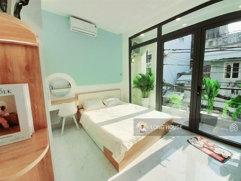 Nhà 55m2, ngang 4m, sổ nở hậu  hẻm oto thông thích quảng đức