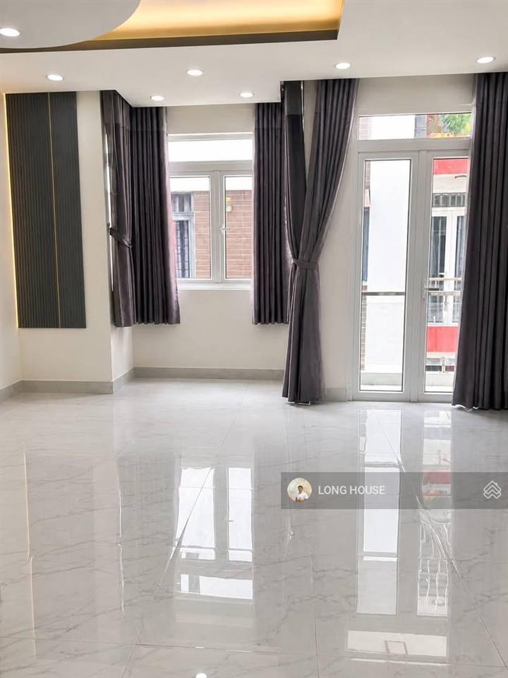 Nhà 5 tầng hẻm oto vào nhà gần mặt tiền ngay chu văn an  phan văn trị