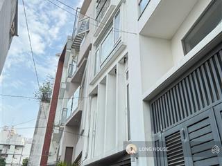 Nhà 5 tầng, 51.6m2 ngang 4m  oto ngủ nhà  ngay lê quang định  bạch đằng  sát bên chợ bà chiểu