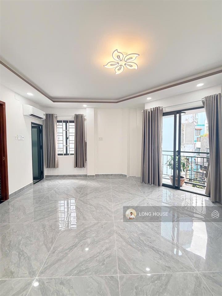Nhà 5 tầng xây mới  căn góc hẻm 6m, xe tải thông  ngay huỳnh văn bánh  lê văn sỹ