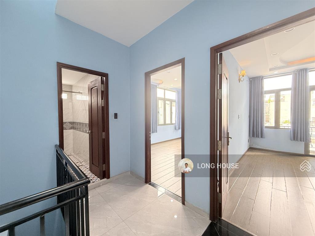 Nhà 4 tầng cách 1 căn ra mặt tiền lê quang định  hẻm trước nhà 4m, sổ nở hậu tài lộc