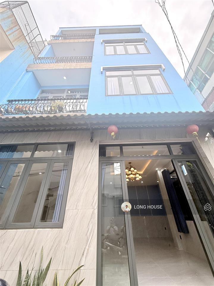 Nhà 4 tầng cách 1 căn ra mặt tiền lê quang định  hẻm trước nhà 4m, sổ nở hậu tài lộc