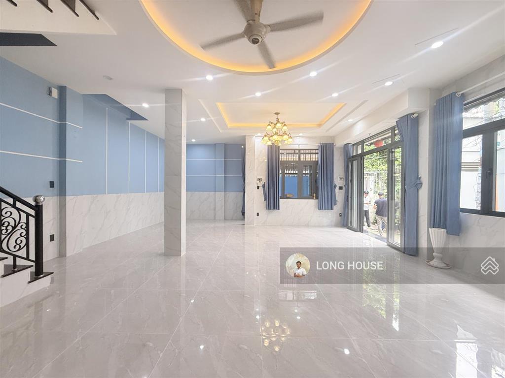 Nhà 4 tầng cách 1 căn ra mặt tiền lê quang định  hẻm trước nhà 4m, sổ nở hậu tài lộc
