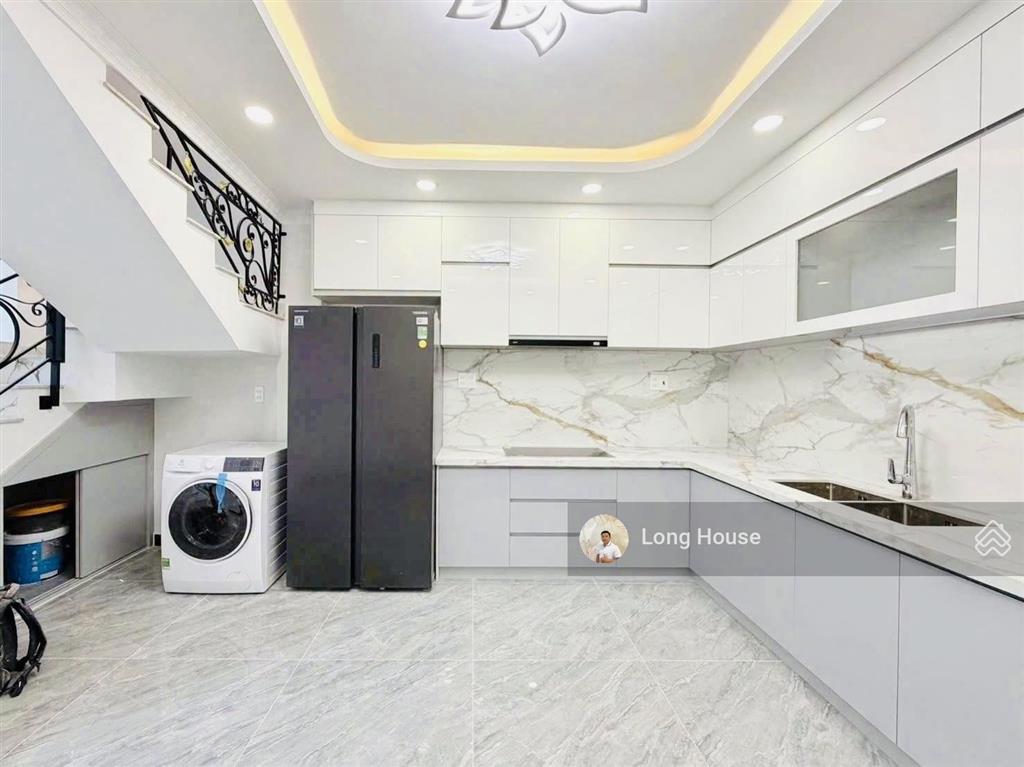 Nhà 5 tầng xây mới, dt 49m², sổ vuông. khu vip ngay mặt tiền nguyễn thị huỳnh  nguyễn văn trỗi