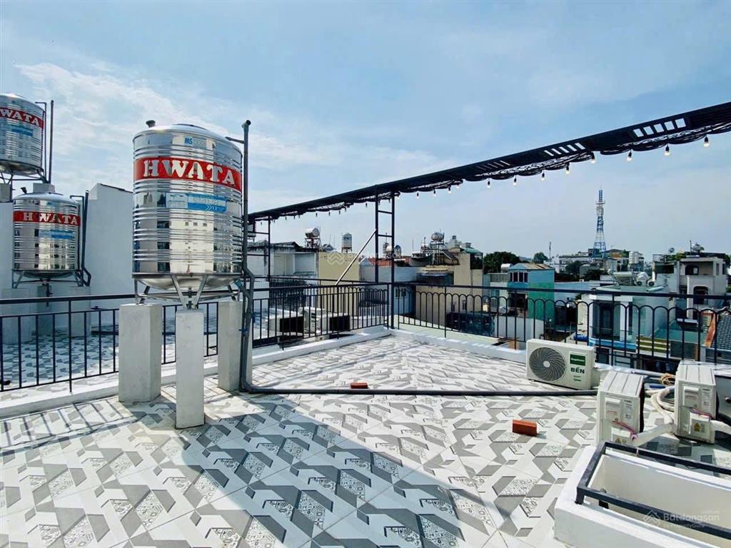Bán nhà mới xây ở quang trung gần chợ hạnh thông tây sân bay emart 2