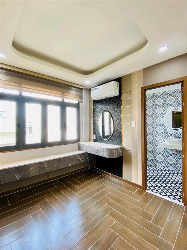 Bán nhà mới xây ở quang trung gần chợ hạnh thông tây sân bay emart 2