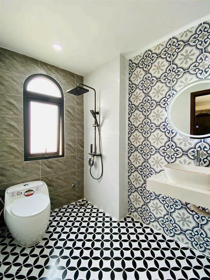 Bán nhà mới xây ở quang trung gần chợ hạnh thông tây sân bay emart 2