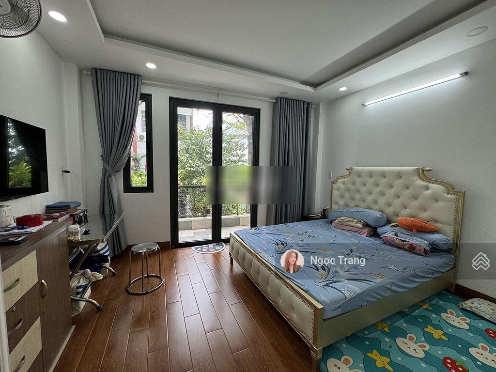 Nhà mới 100% vào ở ngay 4 tầng 4,5x15m  đường 12 xe hơi ngủ trong nhà đặng thùy trâm  đh văn lang