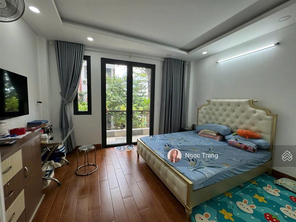 Nhà mới 100% vào ở ngay 4 tầng 4,5x15m  đường 12 xe hơi ngủ trong nhà đặng thùy trâm  đh văn lang