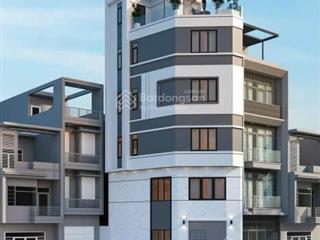 Nhà mới  40m2  6 tầng 1 tum  thang máy 6 điểm dừng  9 tỷ  lô góc 3 mặt thoáng  kinh doanh
