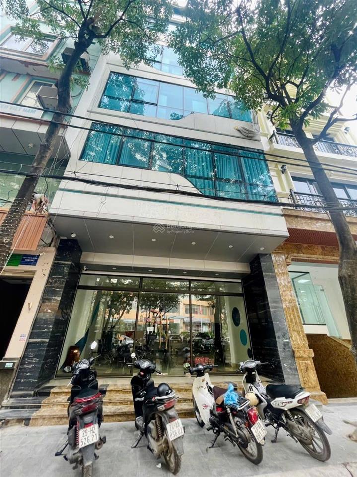 Bán toà nhà văn phòng phố trần quý kiên 91m2mt 6m  thang máy  ô tô tránh  20m ra mặt phố