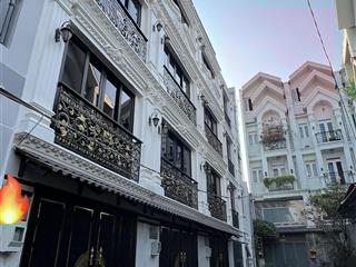 Nhà 5 tầng hẻm nhựa xe hơi, phạm văn đồng, cv gia định  sát mặt tiền  5 tầng mới keng