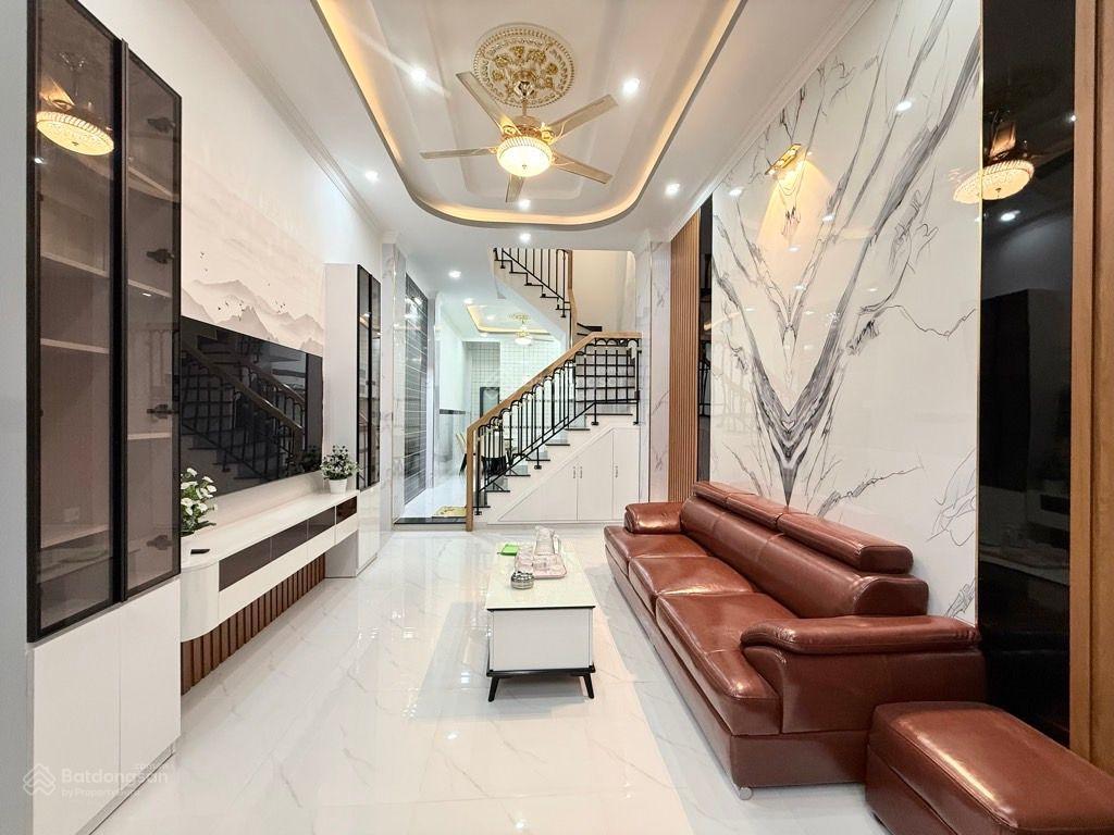 Bán nhà xây mới khu đồng bộ cao tầng  hẻm xe hơi né nhau