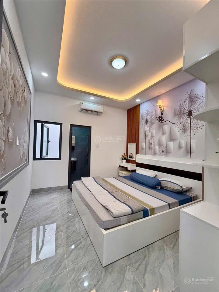 Bán nhà xây mới khu đồng bộ cao tầng  hẻm xe hơi né nhau