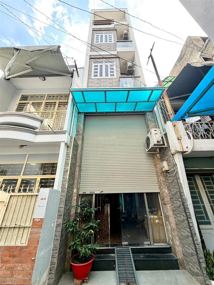 Sát mặt tiền nguyễn trọng tuyển. nhà 5 tầng, 5 phòng ngủ