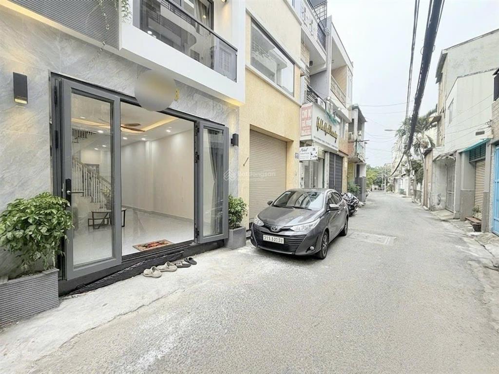 Bán nhà xây mới hẻm xe hơi 8m đối diện siêu thị emart phan văn trị