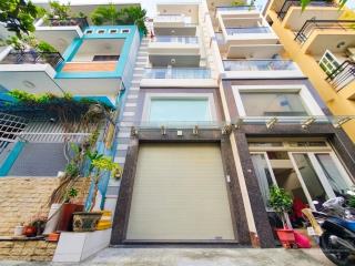 Xe hơi 7 chỗ vào nhà, nhà đẹp phường 8 phú nhuận, dân trí cao