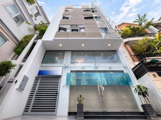 Hẻm 33 ngay phan xích long  23 phòng  7 tầng, thang máy, ô tô 7c đậu cửa  26.2 tỷ (tl)