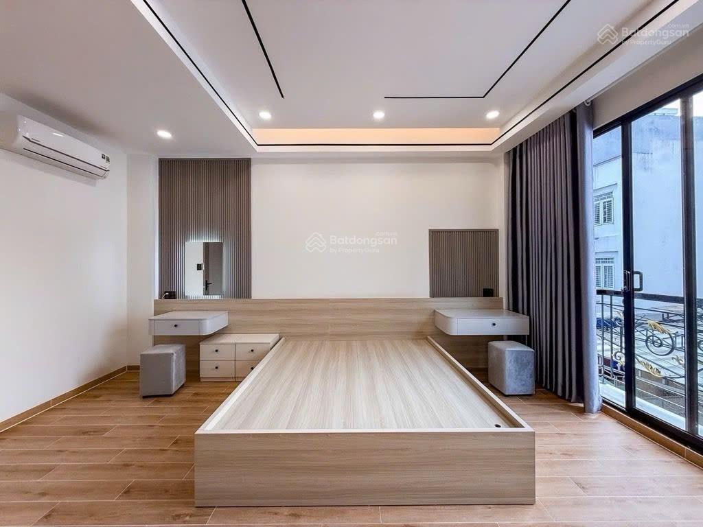 Hẻm 33 ngay phan xích long  23 phòng  7 tầng, thang máy, ô tô 7c đậu cửa  26.2 tỷ (tl)