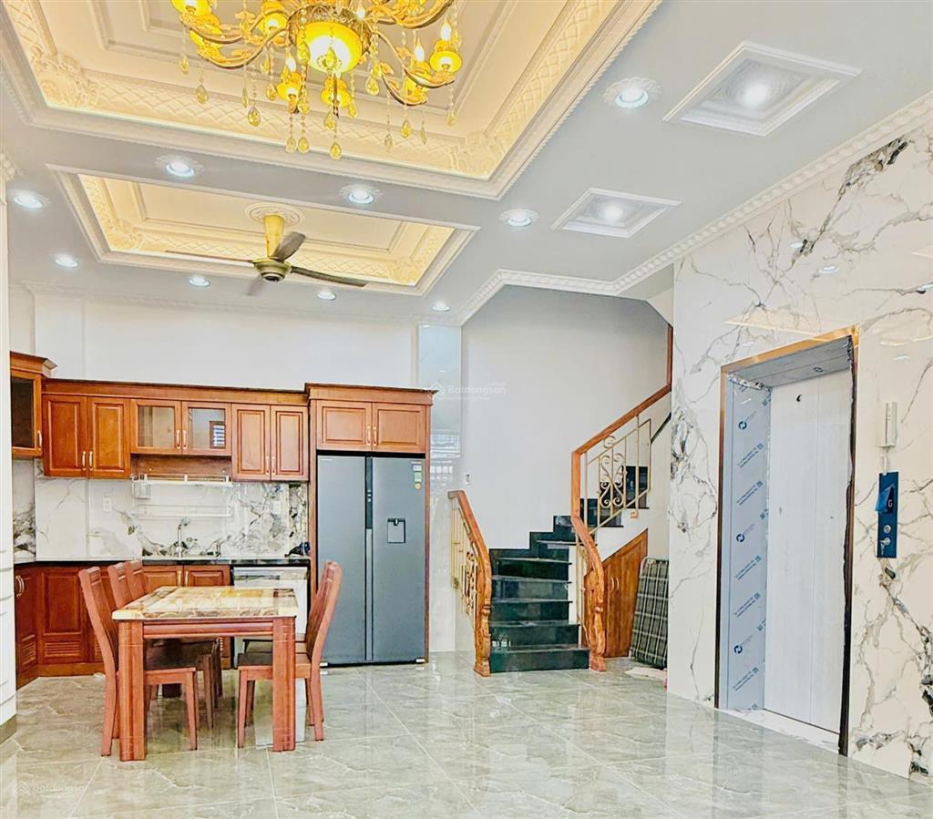 Mặt tiền ngay phan đăng lưu  ngang khủng 6.5m  thang máy  5 tầng mới tinh!