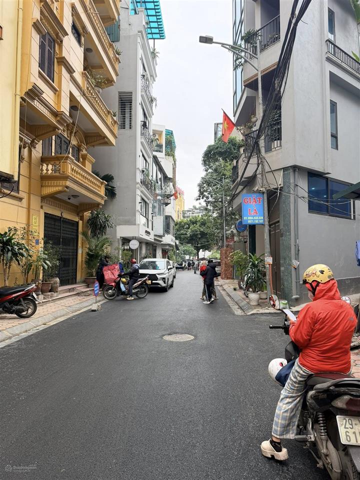 Phố hoàng văn tháimặt ngõ ô tô tránh  kinh doanh sầm uấtmặt tiền khủng2 mặt ngõ