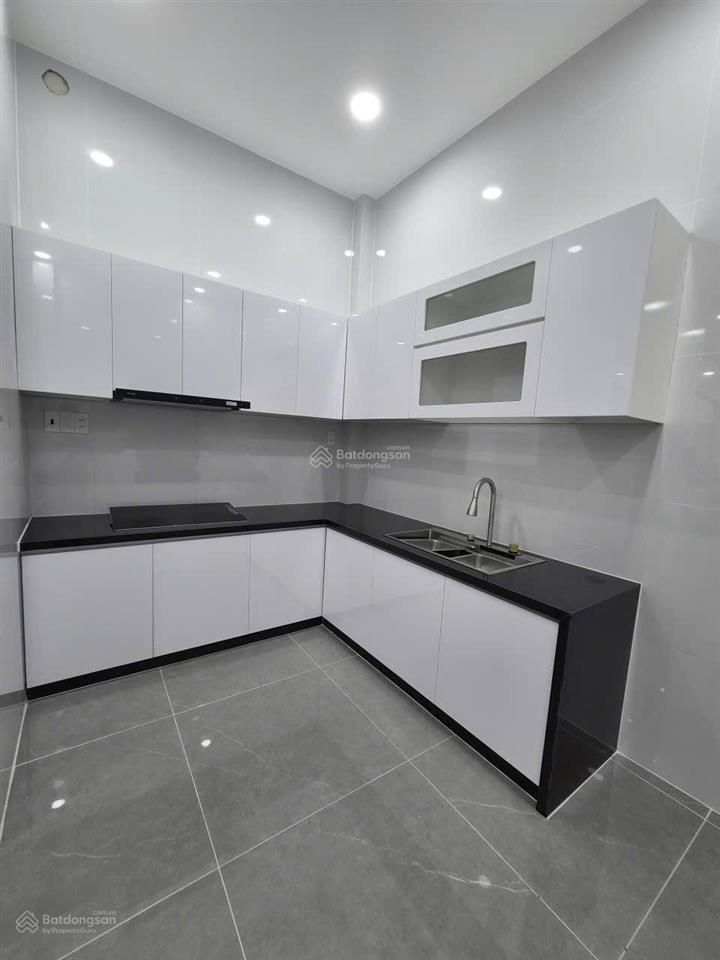 Nhà 4 tầng hẻm xe hơi 8m gần luỹ bán bích  hoà bình  đầm sen .