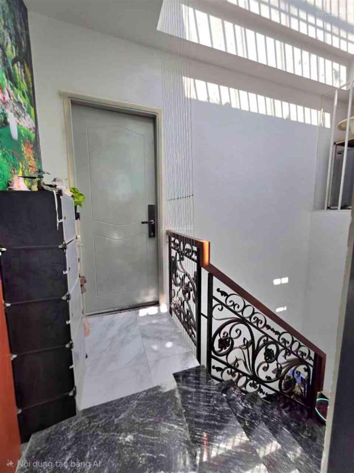 Nhà 4 tầng hẻm xe hơi 6m  ngay chợ lê văn quới.
