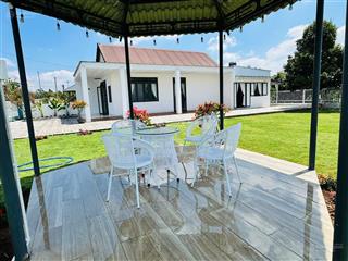 Chính chủ bán nhà vườn tại bảo lộc, nền 619m2 ngang 23.3m  có sân vườn  2pn và 2wc