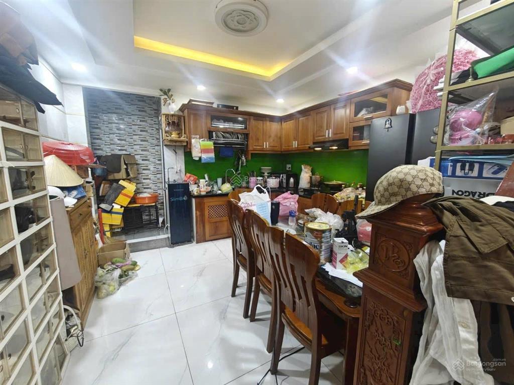 Hẻm ô tô 5m thông lê văn quới  khu cao tầng  4m x 14m  xây 5 tầng hoàn công đầy đủ