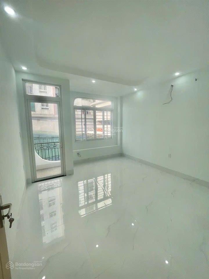 Nhà an dương vương  quận 8  4 tầng  xe hơi ngủ nhà  42m2  gần mặt tiền  6.x tỷ.