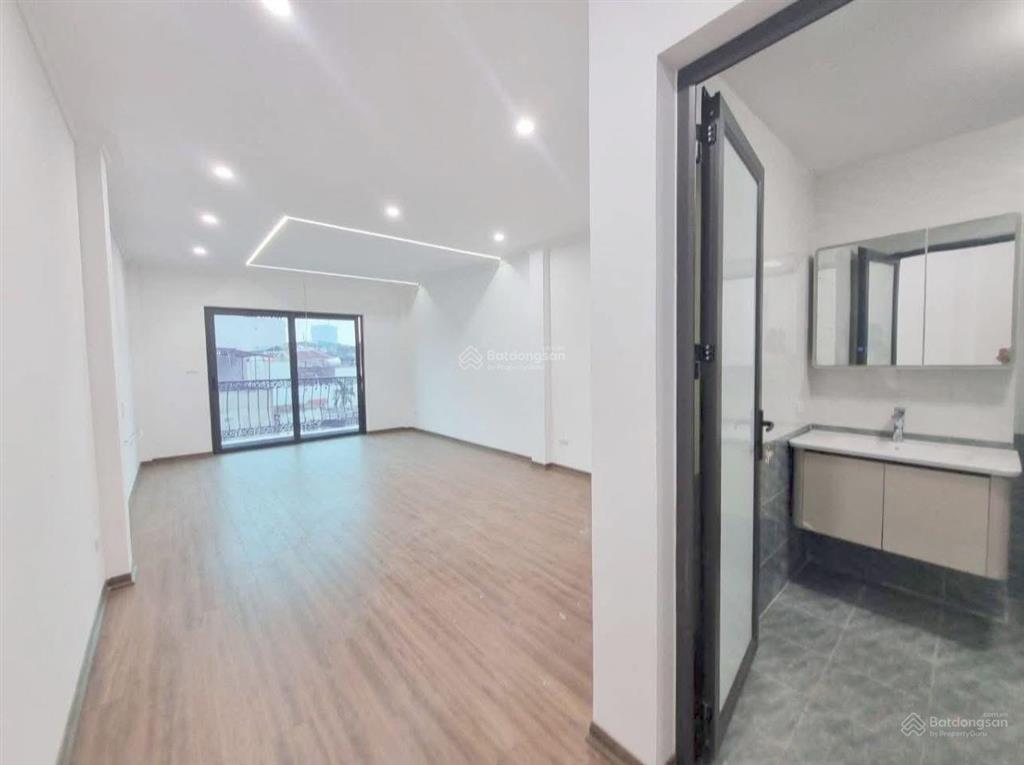 Nhà mới tinh 35m 6 tầng thang máy ô tô đỗ cửa ngay đường bằng b gần trường c2 linh đàm giá 7,6 tỷ