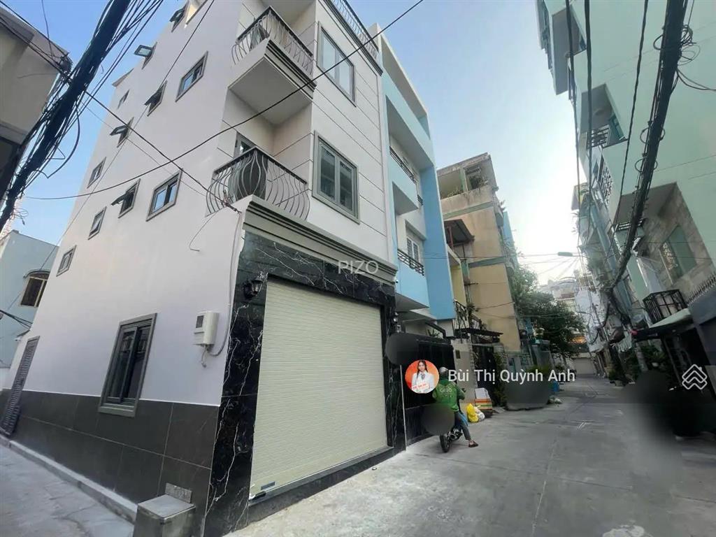 Góc 2 mặt hxh phan xích long pn 4 tầng 5pn có thang máy  (4x13) nở hậu 4,6m giá 15,8 tỷ 0984 518 ***