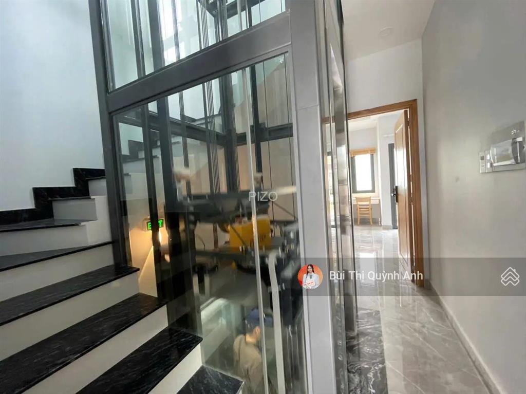 Góc 2 mặt hxh phan xích long pn 4 tầng 5pn có thang máy  (4x13) nở hậu 4,6m giá 15,8 tỷ 0984 518 ***