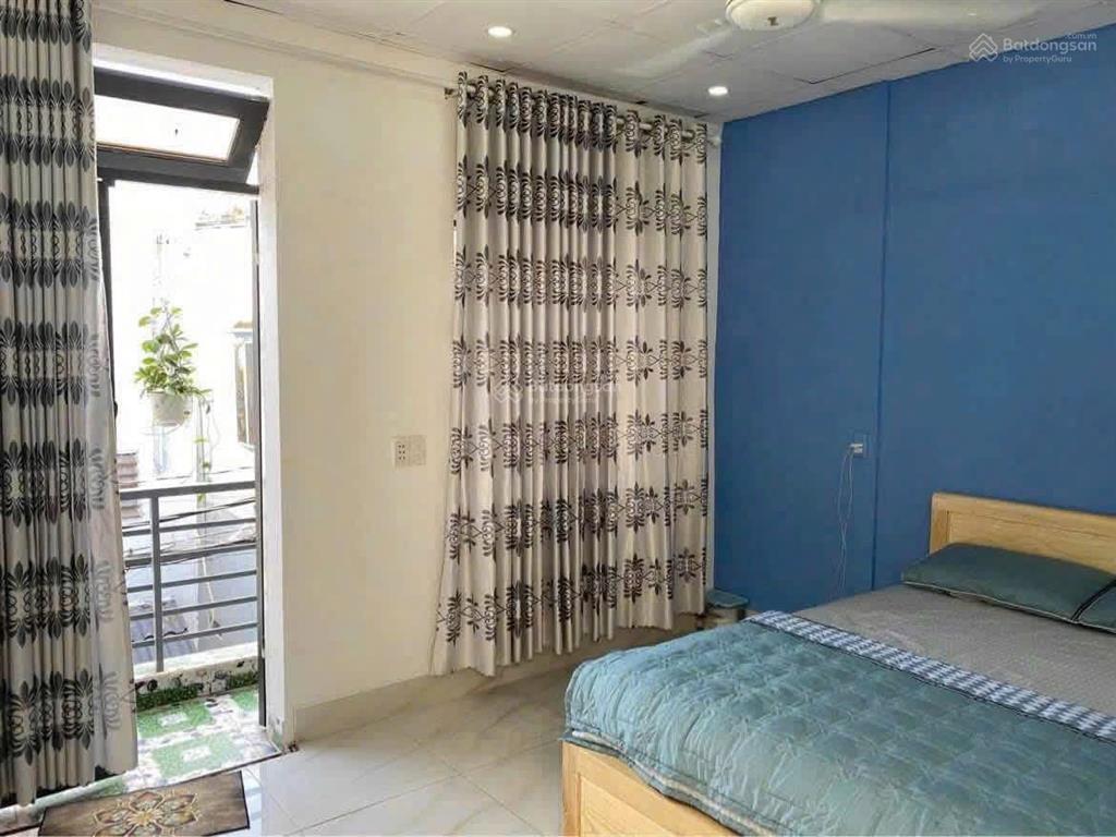 Nhà 5,5 tỷ 3pn hẻm 417 quang trung ngang 4m x 14m xây trệt lầu, ban công trước sau thêm mái bằng