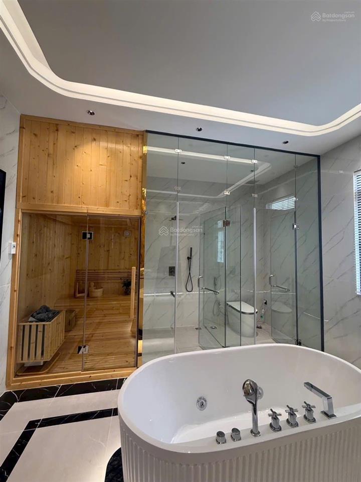Nhà mới măt tiền 4 tầng thang máy xịn mt đường 10m tân mỹ q75x18m19.8 ty