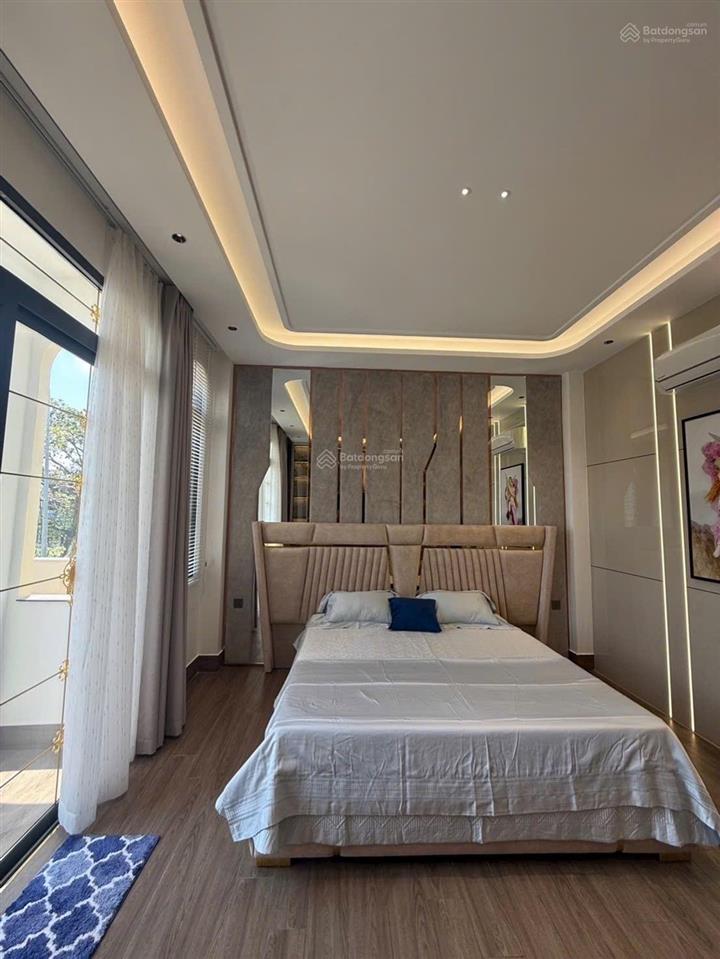 Nhà mới măt tiền 4 tầng thang máy xịn mt đường 10m tân mỹ q75x18m19.8 ty
