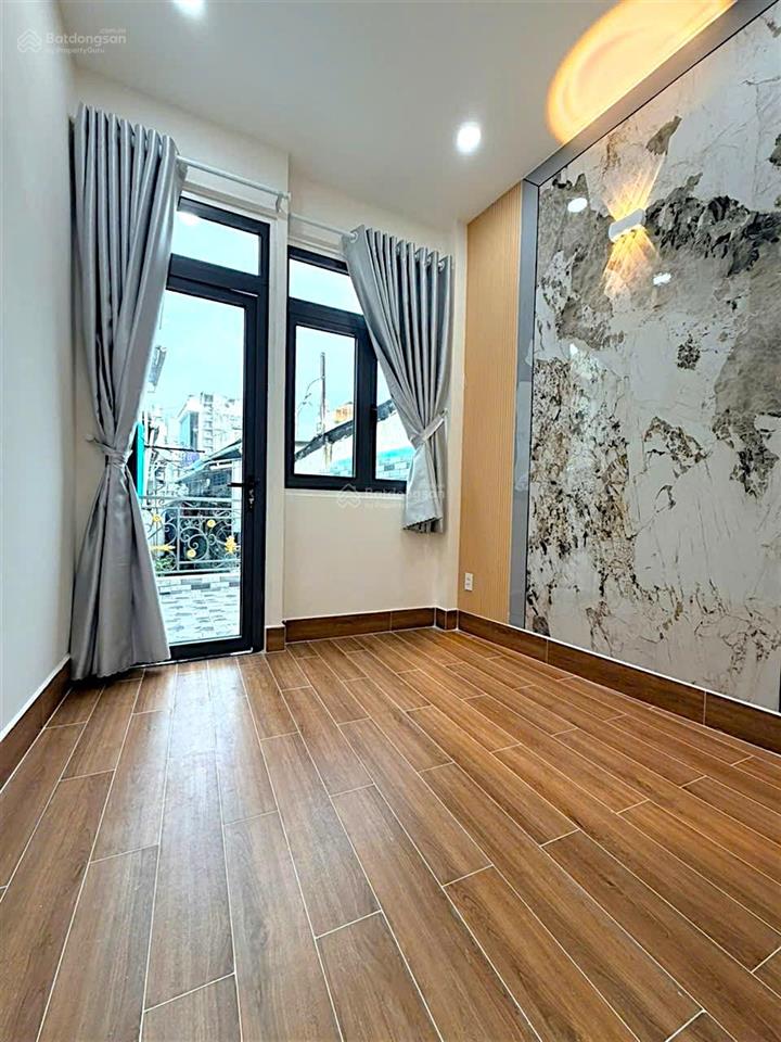Tôn đản  góc vĩnh khánh  quận 4  34m2 nở hậu  3 tầng btct  4pn  chỉ 3tỷ65