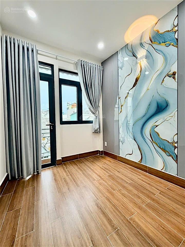 Tôn đản  góc vĩnh khánh  quận 4  34m2 nở hậu  3 tầng btct  4pn  chỉ 3tỷ65