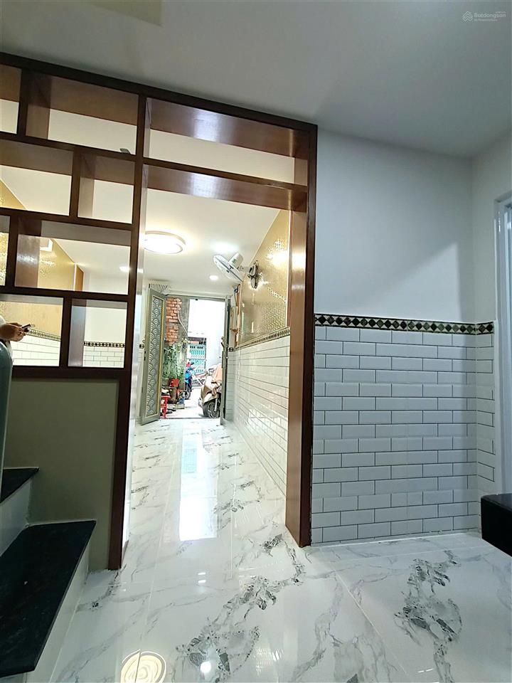 Đoàn văn bơ  quận 4  nhà đẹp 4 tầng btct  4pn  nở hậu l  chỉ 3tỷ05