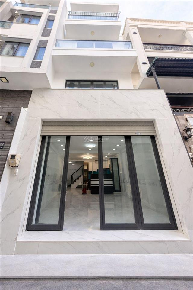 5 tầng btct,44m2 (4,4 x 10), ngộp bank,ô tô 7 chỗ đậu cửa,shr, nhỉnh 7t tl