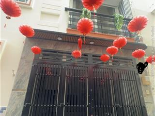 Bán nhà mới 4 tầng gần công viên gia định  oto đỗ cửa