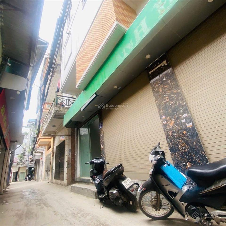 Nhà rẻ vĩnh hưng, mt 4.5m, 5 tầng ô tô đỗ cổng. gần phố