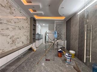 Nhà rẻ vĩnh hưng, mt 4.5m, 5 tầng ô tô đỗ cổng. gần phố