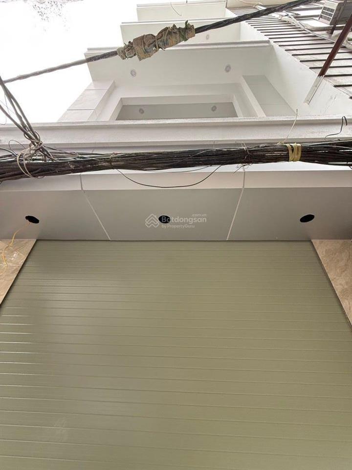 Nhà rẻ vĩnh hưng, mt 4.5m, 5 tầng ô tô đỗ cổng. gần phố