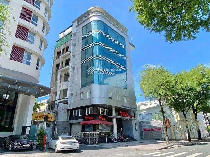 Bán toà nhà mt lý tự trọng  dt 11x23m. cn 230m2  hầm + 11 lầu  hđt 600 triệu/th  giá 140 tỷ