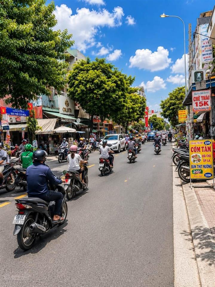 Mặt tiền kinh doanh 20m  lề 5m  kế chợ tân hương  80m  dòng tiền 30 triệu  giá 14.x tỷ