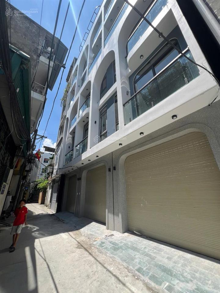 Thạch bàn 38,5m2  6 tầng thang máy  gara ô tô  nhà xây mới 2 thoáng  12,3 tỷ