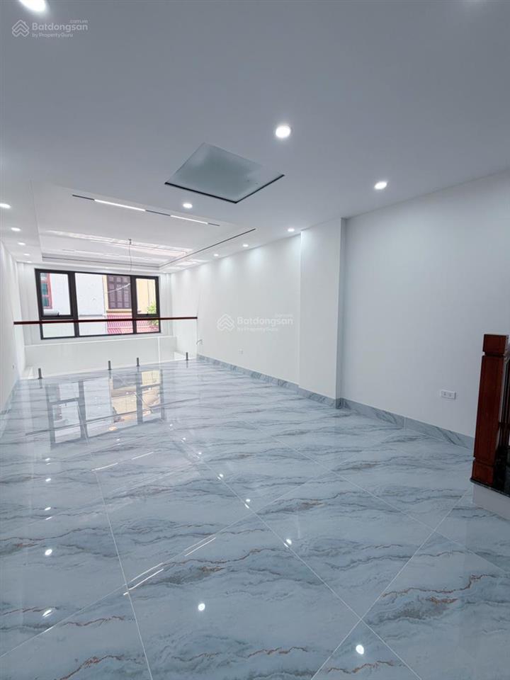 Bát khối  cách phố 10m  ô tô vào gara  nhà mới 7 tầng thang máy  4pn  giá 14.6 tỷ